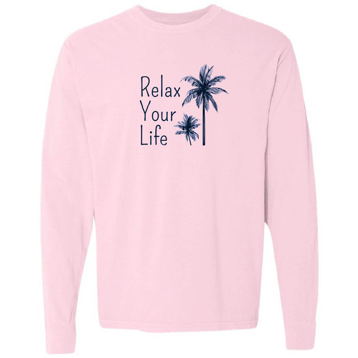 Pink sweatshirt with 'Relax Your Life' text and palm tree graphics on a white background