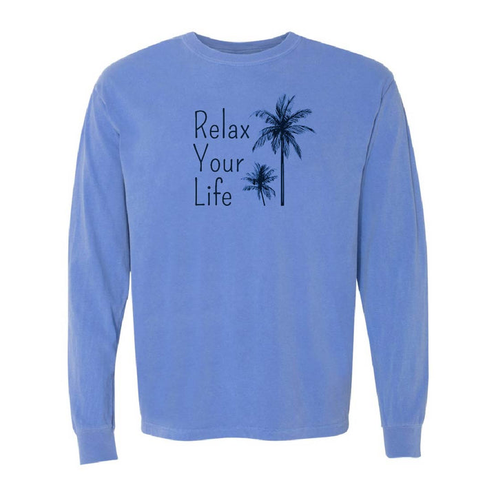 Blue long-sleeve shirt with 'Relax Your Life' text and palm tree design on a white background