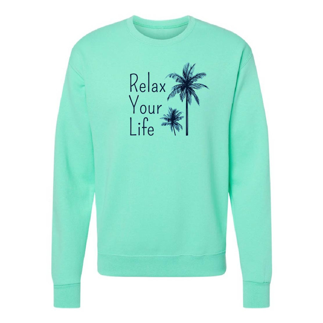 Mint green sweatshirt with 'Relax Your Life' text and palm tree graphics on a white background