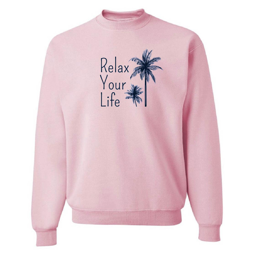 Pink sweatshirt with 'Relax Your Life' text and palm tree graphics on a white background