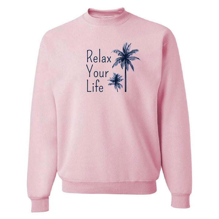Pink sweatshirt with 'Relax Your Life' text and palm tree graphics on a white background