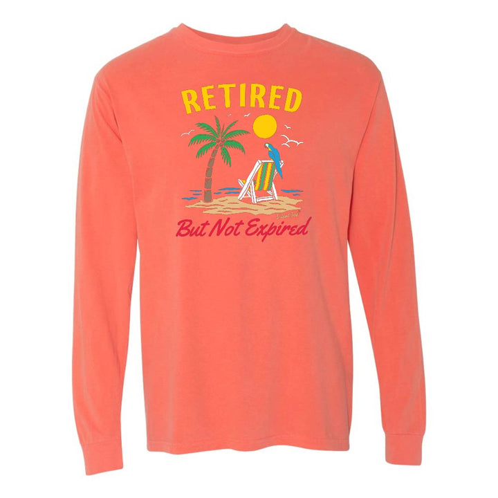 Light orange/red blue long-sleeve shirt with a beach graphic and 'Retired But Not Expired' text.