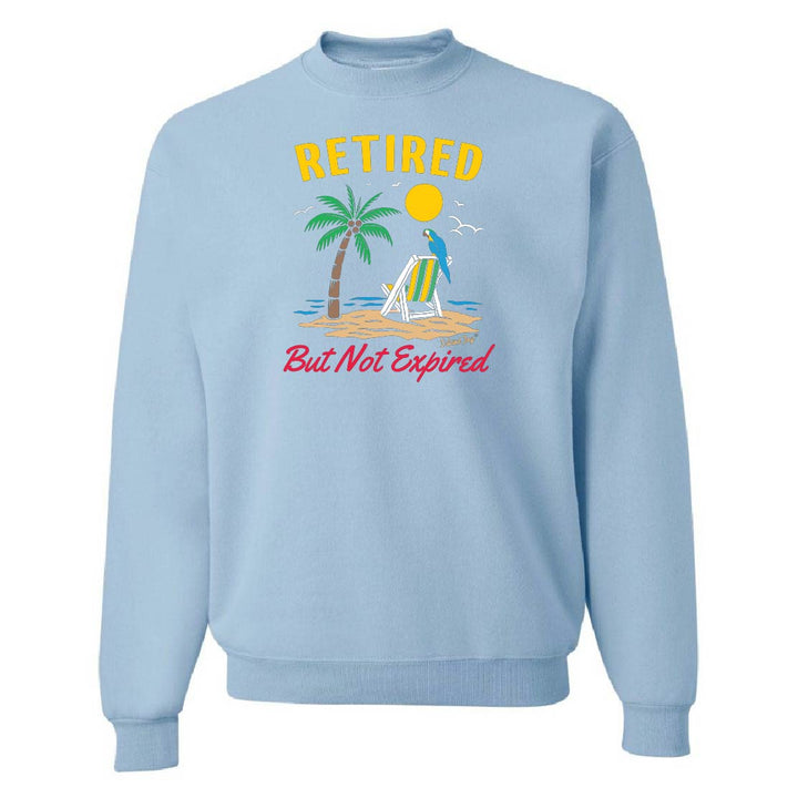 Light blue sweatshirt with "Retired But Not Expired" design