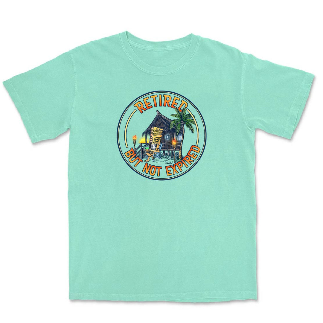 Mint green t-shirt with a tropical design and text on a white background