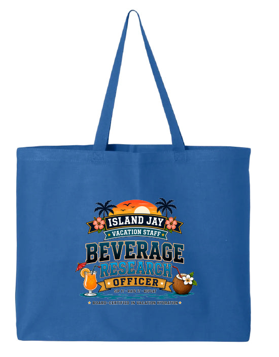 A blue canvas tote bag with a colorful graphic print on the front that reads 'ISLAND JAY VACATION STAFF BEVERAGE RESEARCH OFFICER' with tropical illustrations including a sunset, palm trees, a cocktail, flowers, and a coconut.