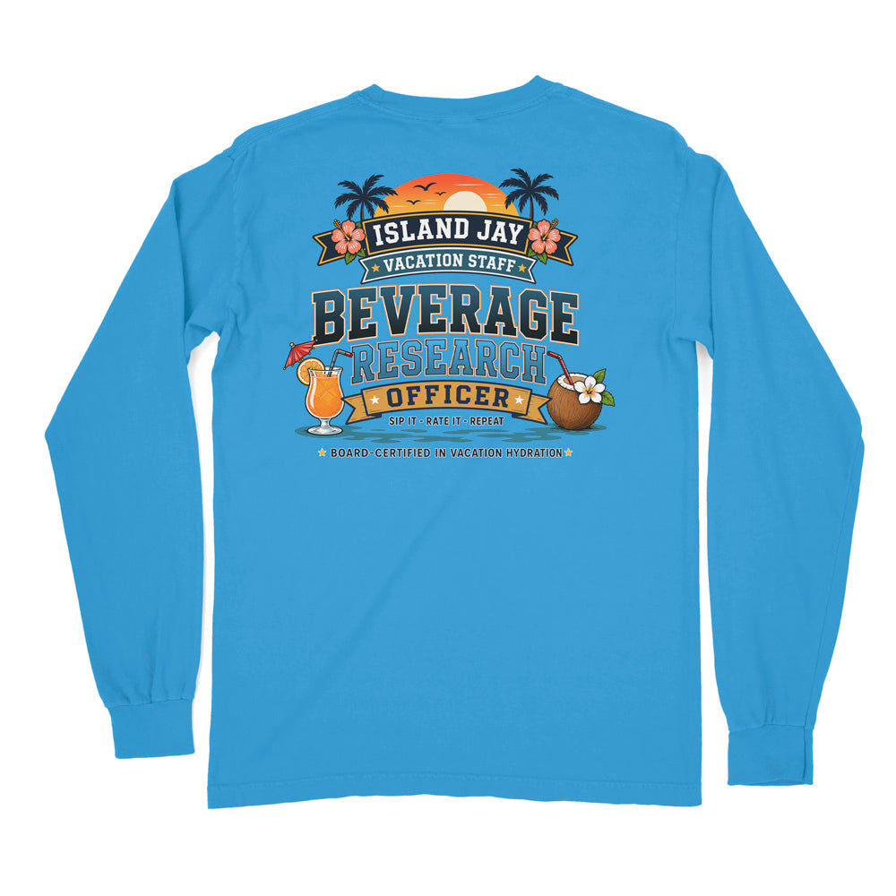 A light blue long-sleeve t-shirt shown from the back, featuring a colorful graphic print with tropical elements and the text 'ISLAND JAY BEVERAGE RESEARCH OFFICER'.