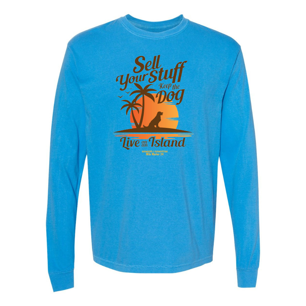 Blue long-sleeve shirt with a graphic design and text on a white background