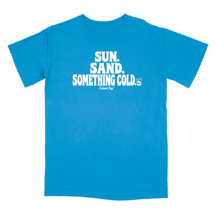 A royal caribe blue short-sleeve t-shirt with a white graphic print on the chest reading 'SUN. SAND. Something Cold