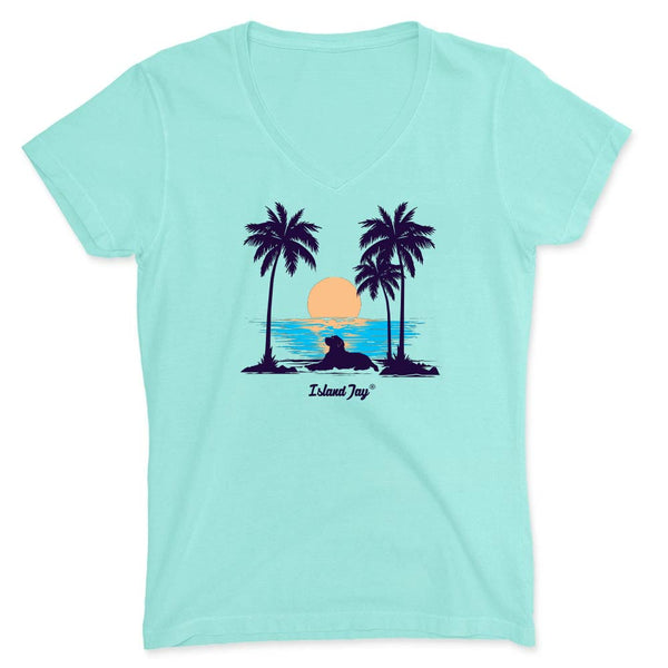 Light blue t-shirt with a tropical design featuring palm trees and a sunset, branded 'Island Jay'.