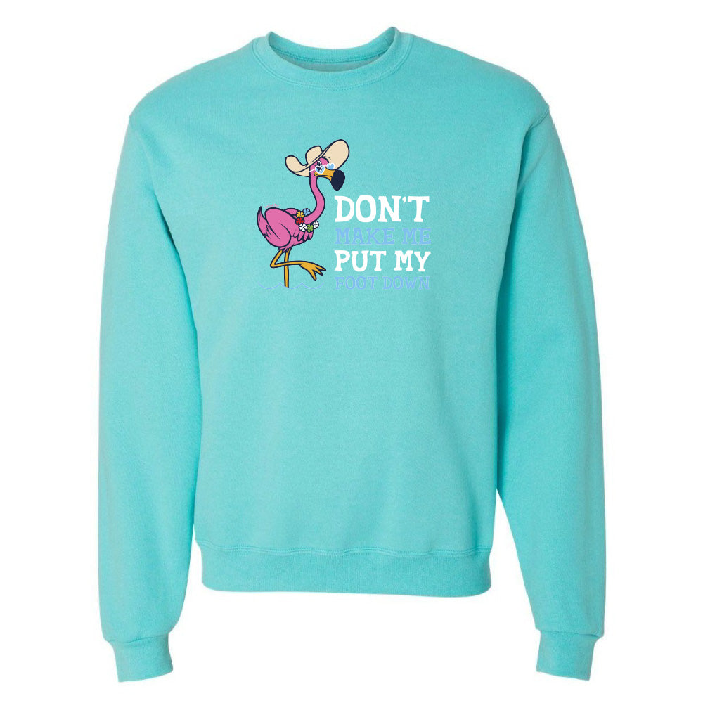 Turquoise sweatshirt with a cartoon flamingo and text on a white background