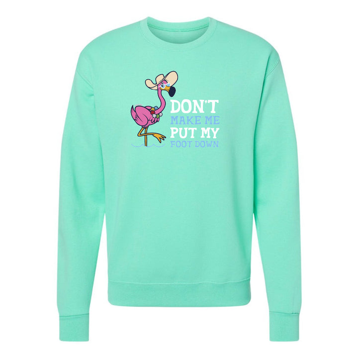 Mint green sweatshirt with a flamingo graphic and text on a white background