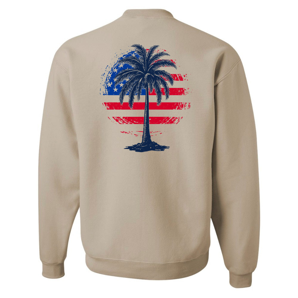 Beige sweatshirt with a palm tree design on the back featuring the American flag.