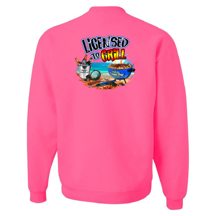 Pink sweatshirt with 'Licensed to Grill' graphic on the back