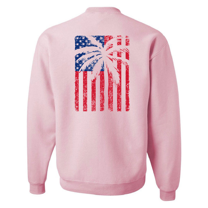 Pink sweatshirt with American flag design on the back against a white background