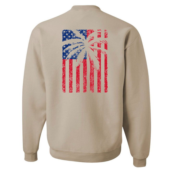 Beige sweatshirt with American flag and palm tree design on the back against a white background