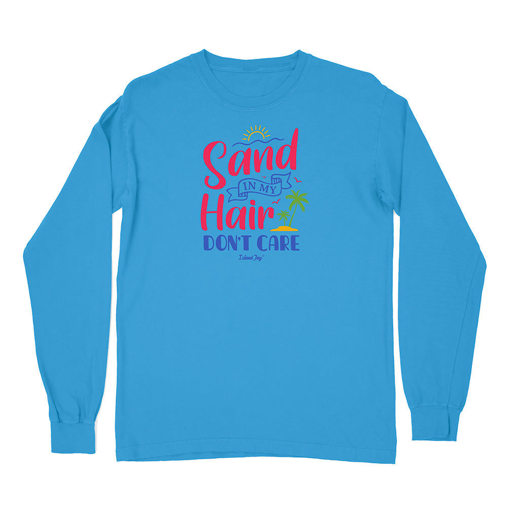 Blue long-sleeve shirt with 'Sand in My Hair Don't Care' text and graphics on a white background