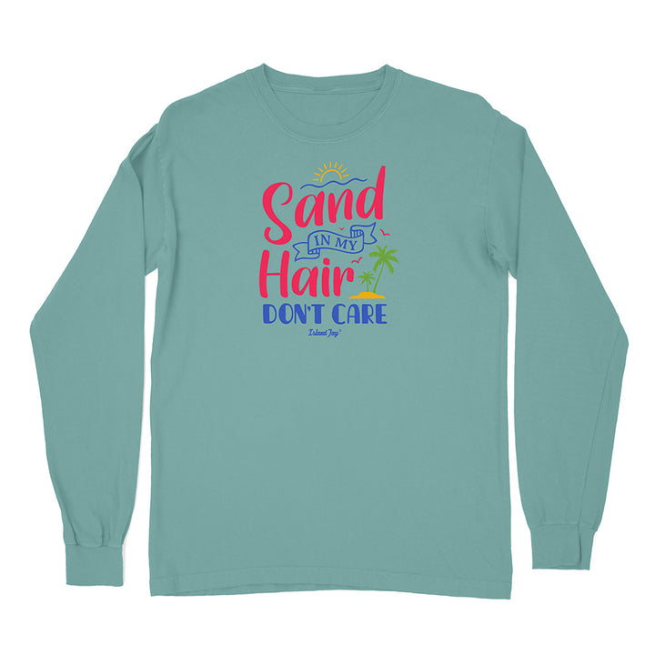 Teal long-sleeve shirt with 'Sand in My Hair Don't Care' text and graphics on a white background