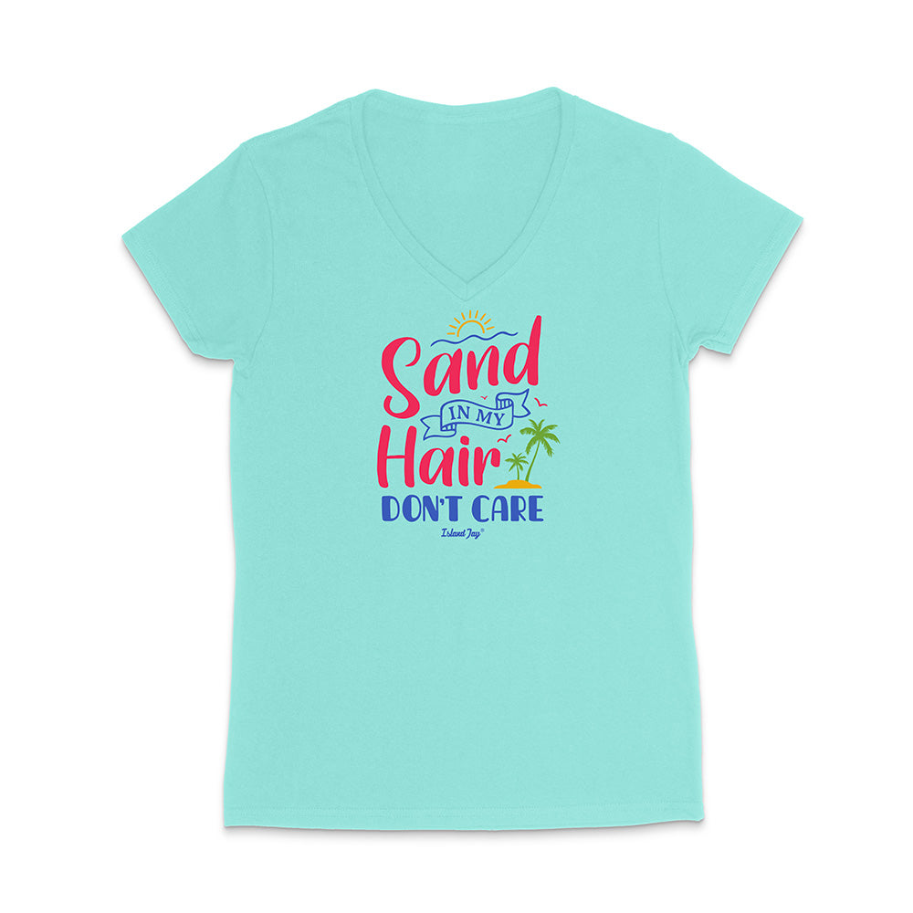 Mint t-shirt with colorful text reading "Sand In My Hair Don't Care" on a white background