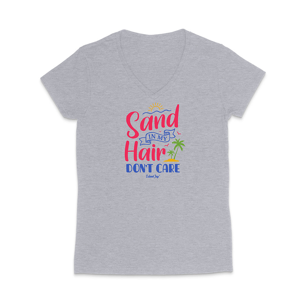 Grey t-shirt with colorful text reading "Sand In My Hair Don't Care" on a white background