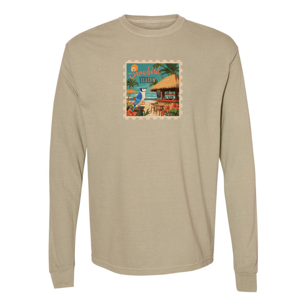 Khaki long-sleeve shirt with a colorful graphic on a white background