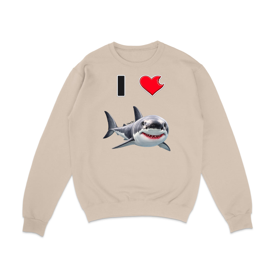A beige crewneck sweatshirt featuring a graphic print of a great white shark and the text 'I' followed by a red heart, displayed on a clean white background.