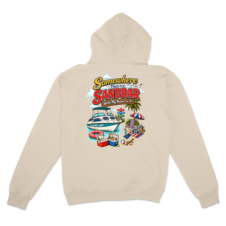 A beige pullover hoodie shown from the back, featuring a colorful graphic print with the text 'Somewhere in the Sandbar' and an illustration of a boat, beach umbrella, palm tree, and poolside scene.