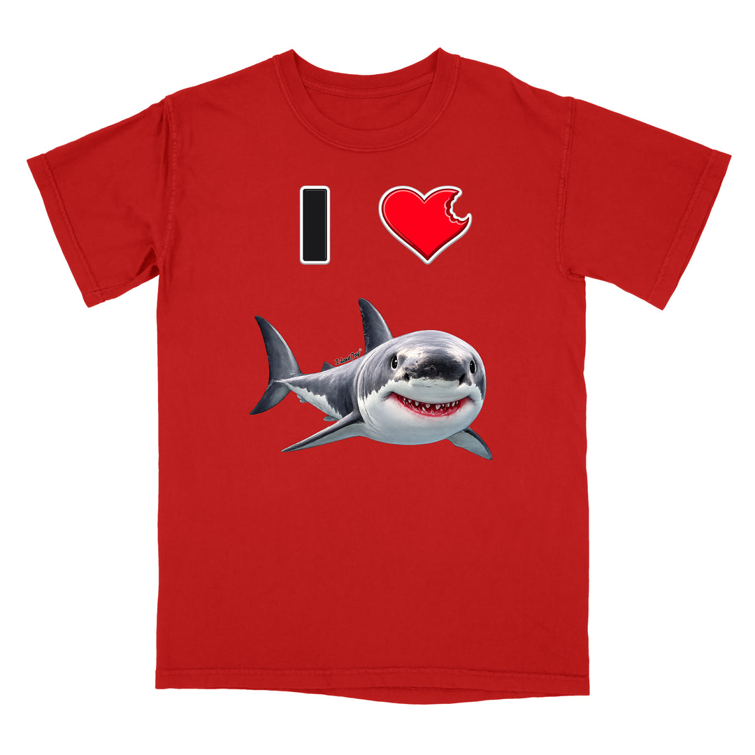 A red short-sleeve crewneck t-shirt featuring a graphic print of a cartoon great white shark and the text 'I' followed by a red heart with a bite taken out of it, on a plain white background.