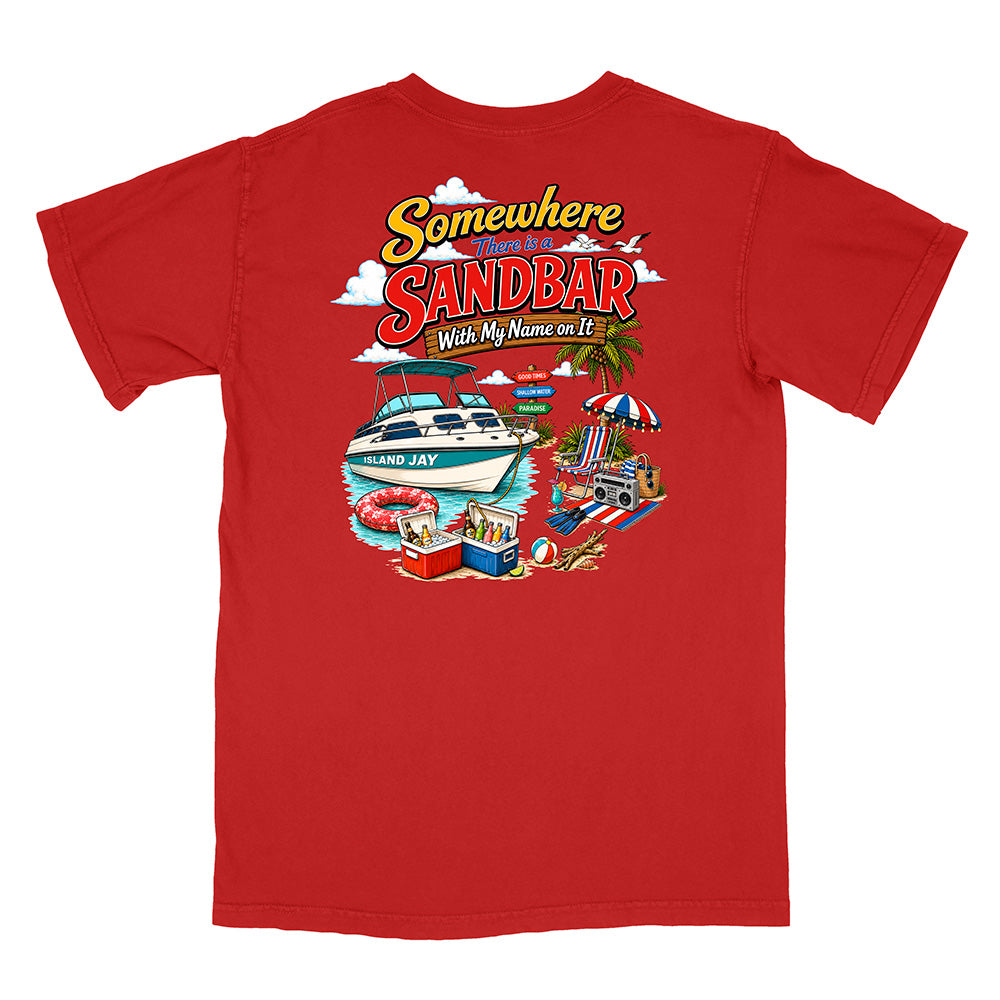 A red short-sleeve t-shirt with a colorful graphic print on the front featuring a white speedboat, beach umbrellas, a palm tree, and the text 'Somewhere Over The Sandbar With My Name on It'.