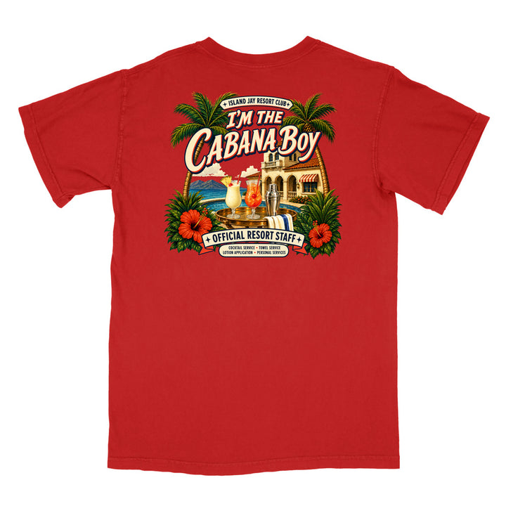 A red short-sleeve t-shirt shown flat against a white background, featuring a large colorful graphic print on the front with tropical palm trees, hibiscus flowers, a beach scene, and the text 'I'm The Cabana Boy' and 'Official Resort Staff'.