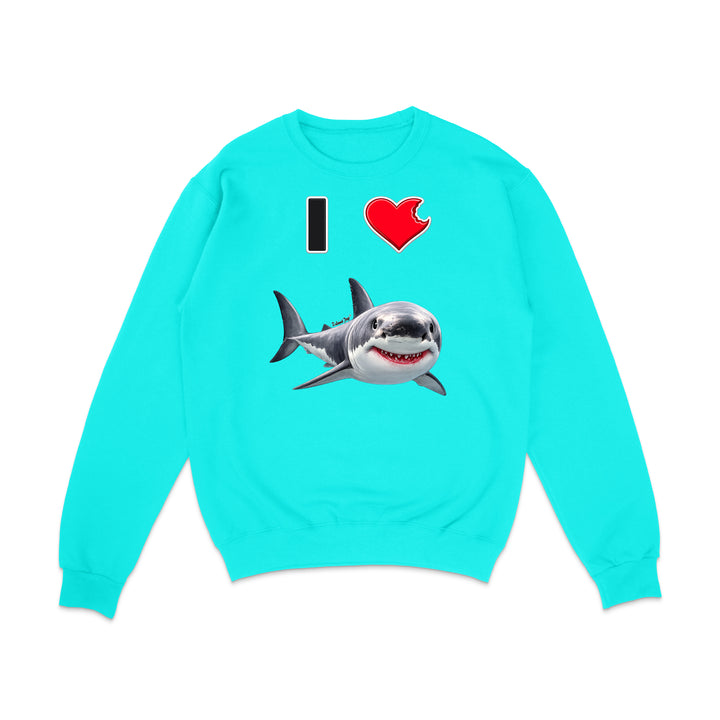 A bright turquoise crewneck sweatshirt featuring a graphic print of a great white shark and the text 'I' followed by a red heart, displayed on a clean white background.
