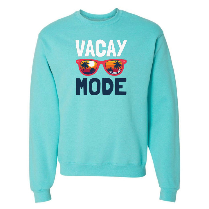 Turquoise sweatshirt with 'VACAY MODE' text and sunglasses graphic on a white background