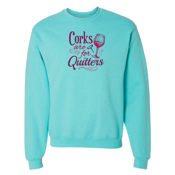 Turquoise sweatshirt with pink text and wine glass graphic on a white background