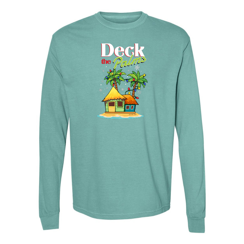 Teal long-sleeve shirt with a tropical hut and palm tree design and graphic text reading "Deck The Palms" on a white background