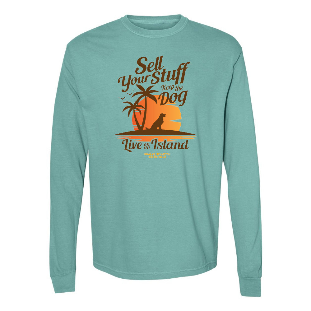 Teal long-sleeve shirt with a graphic design and text on a white background