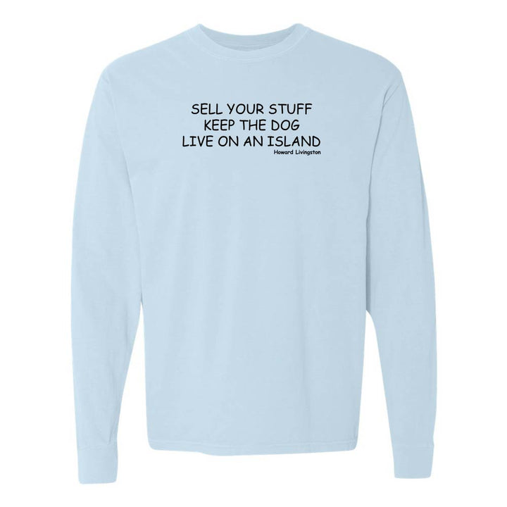 Light blue long-sleeve shirt with black text reading "Sell Your Stuff Keep The Dog Live On An Island - Howard Livinston".