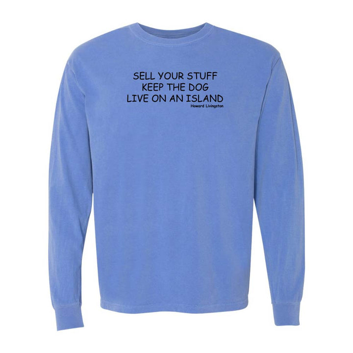 Blue long-sleeve shirt with black text reading "Sell Your Stuff Keep The Dog Live On An Island - Howard Livinston".
