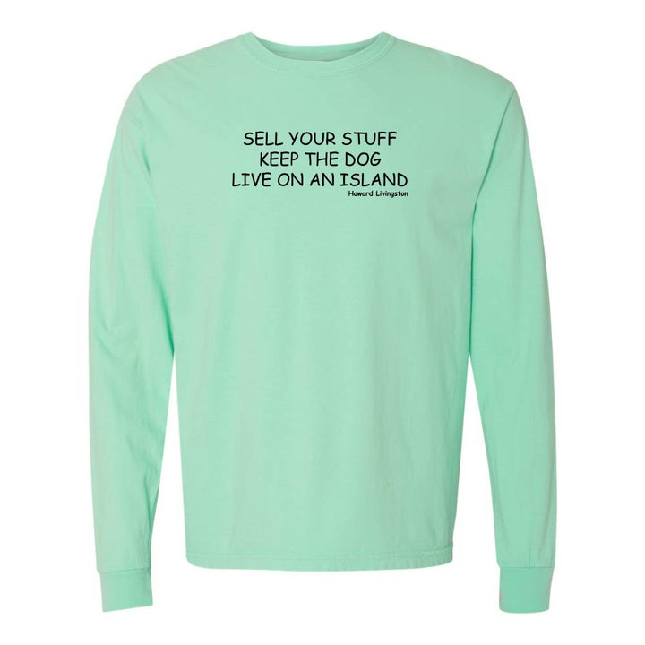 Reef long-sleeve shirt with black text reading "Sell Your Stuff Keep The Dog Live On An Island - Howard Livinston".