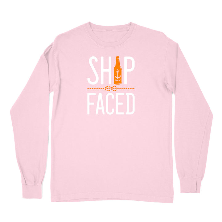 Pink long-sleeve shirt with 'Ship Faced' graphic design on a white background