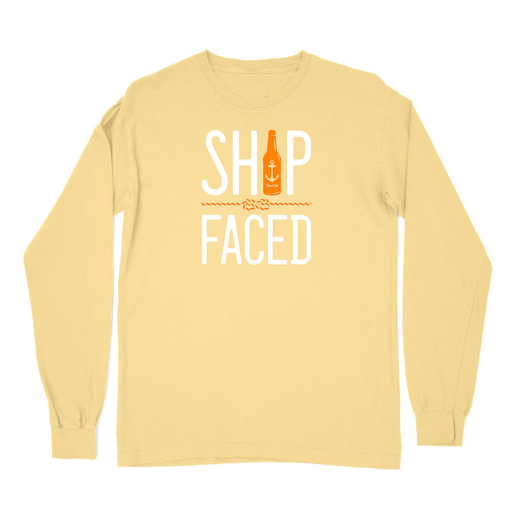 Yellow long-sleeve shirt with 'Ship Faced' graphic design on a white background