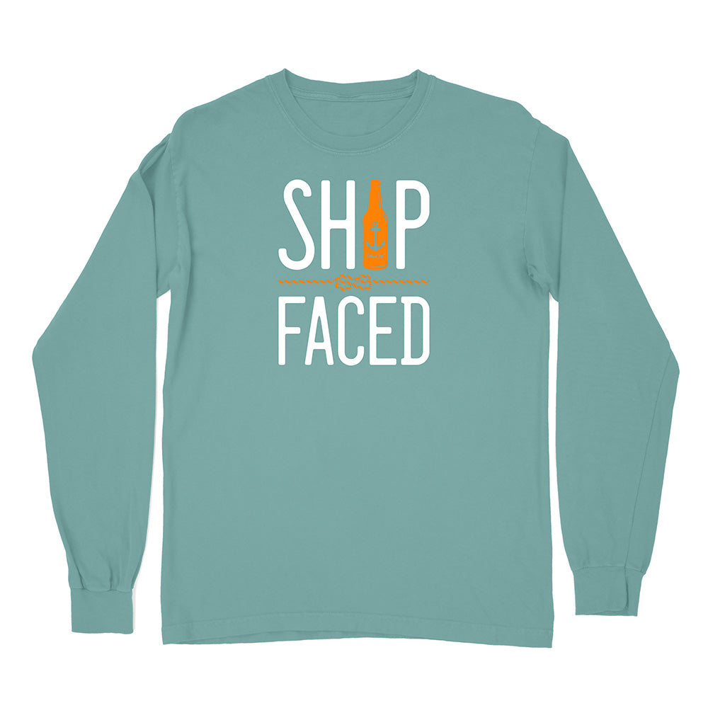 Teal long-sleeve shirt with 'SHIP FACED' text and bottle graphic on a white background