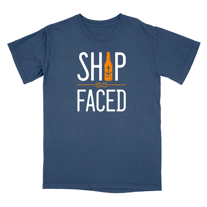 Blue t-shirt with 'Ship Faced' text and bottle graphic on a white background