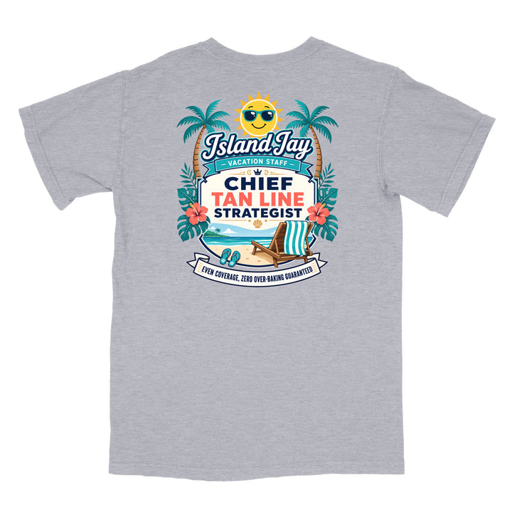 A grey short-sleeve t-shirt with a colorful graphic print on the front. The graphic features a smiling sun wearing sunglasses, palm trees, a beach scene, and text that reads 'Island Jay Vacation Staff by CHIEF TAN LINE STRATEGIST'.