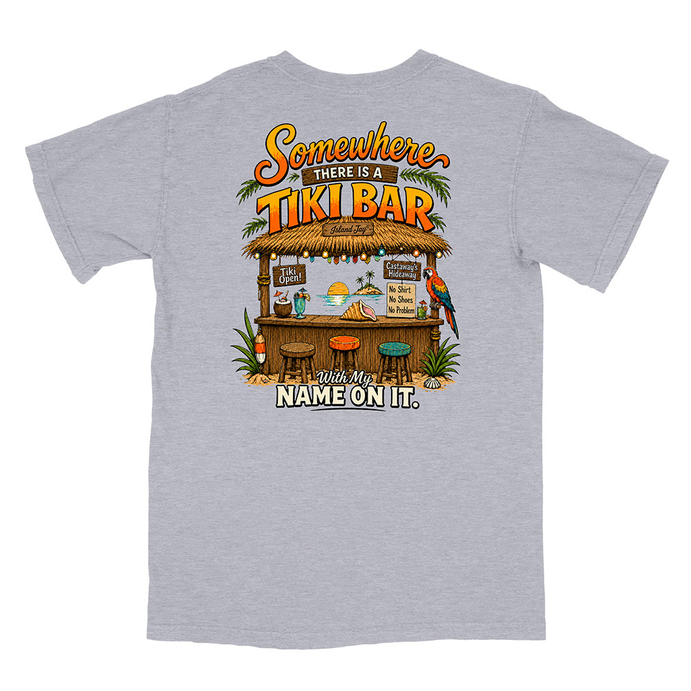 A heather gray short-sleeve t-shirt shown from the back, featuring a large, colorful graphic print of a tropical tiki bar with the text 'Somewhere THERE IS A TIKI BAR' and 'With My NAME ON IT.'.