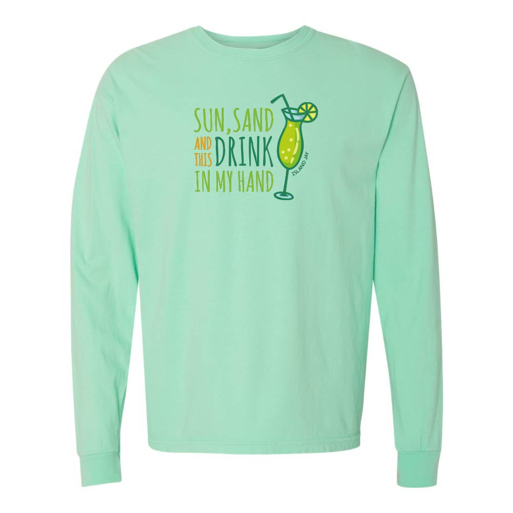 Mint green long-sleeve shirt with a graphic and text reading "Sun, Sand and this Drink In my Hand".