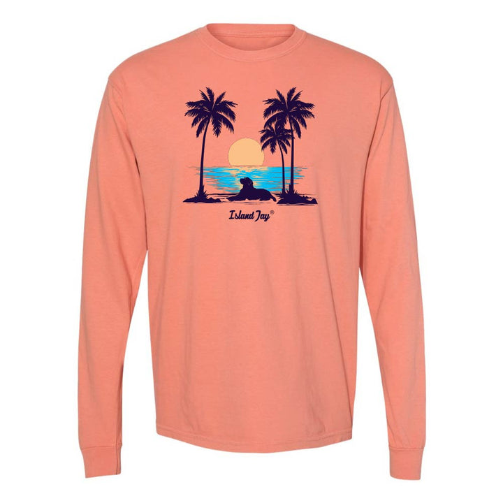 Light Orange Long Sleeve T-Shirt with sunset, dog and palm trees graphic.