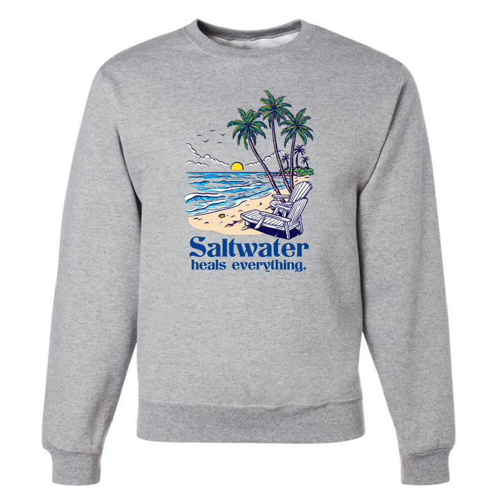 Gray sweatshirt with a beach graphic and 'Saltwater heals everything' text on a white background