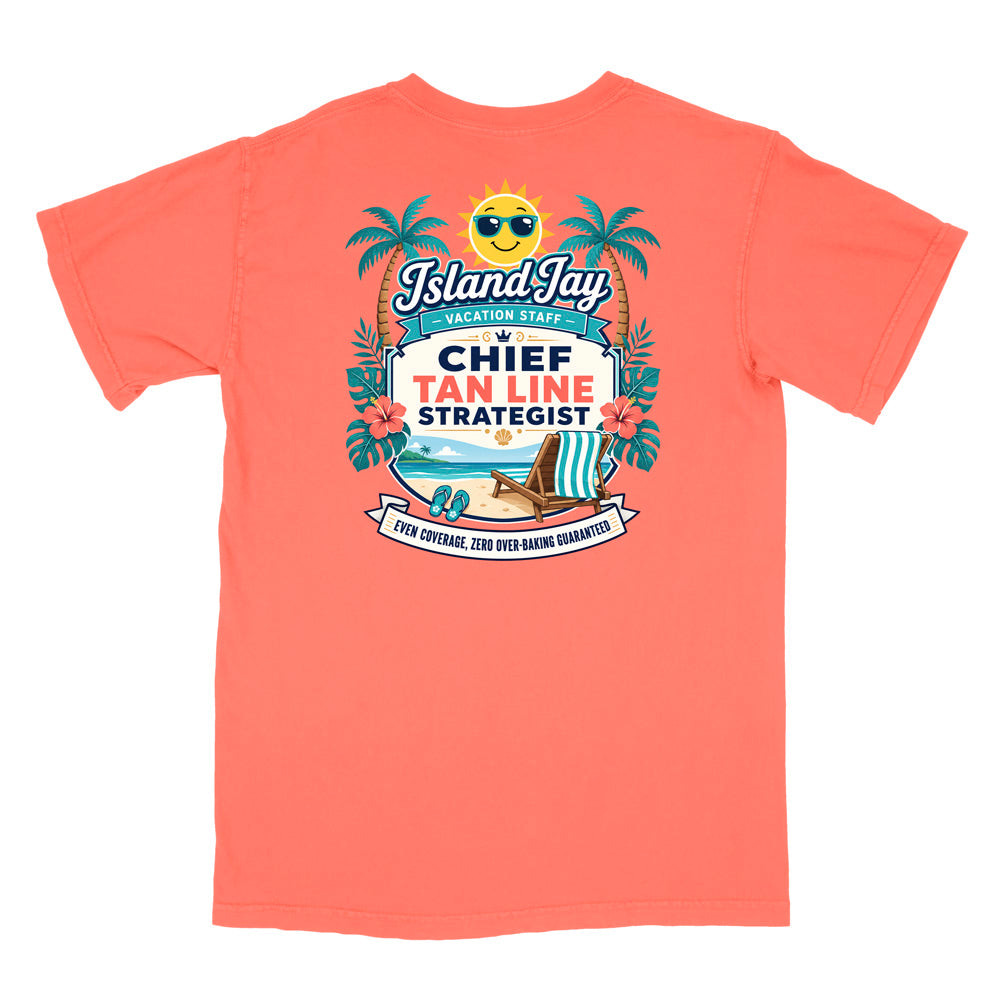 A coral short-sleeve t-shirt with a colorful graphic print on the front. The graphic features a smiling sun wearing sunglasses, palm trees, a beach scene, and text that reads 'Island Jay Vacation Staff by CHIEF TAN LINE STRATEGIST'.