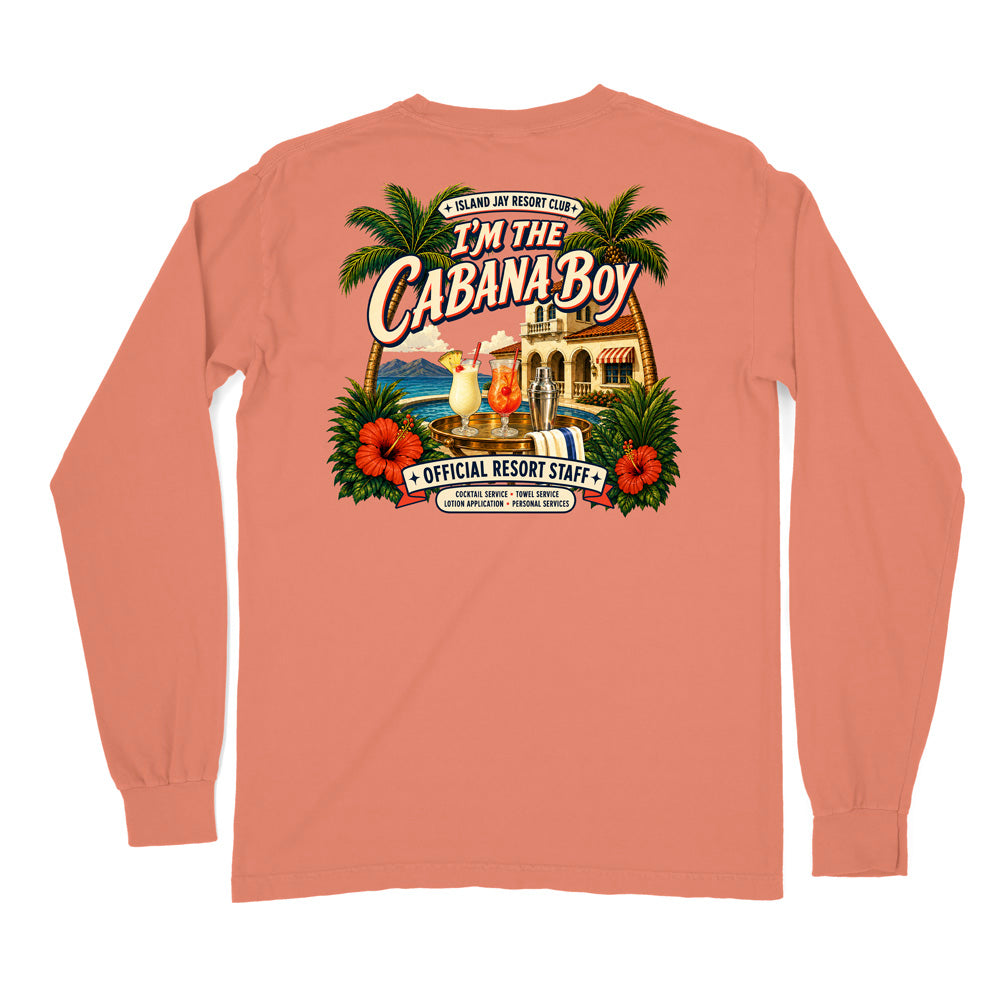 A long-sleeve t-shirt in a salmon pink color, shown from the back. The back features a large, colorful graphic print with palm trees, hibiscus flowers, a cocktail, and resort imagery, with the text 'I'M THE CABANA BOY' and 'OFFICIAL RESORT STAFF'.