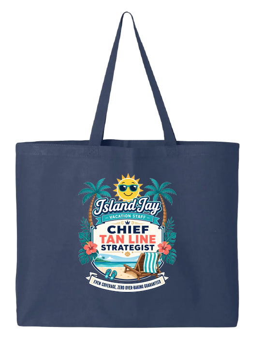 A navy blue canvas tote bag with long handles, featuring a colorful graphic print on the front that reads 'Island Jay Vacation Staff Chief Tan Line Strategist' with a sun, palm trees, and beach illustration.