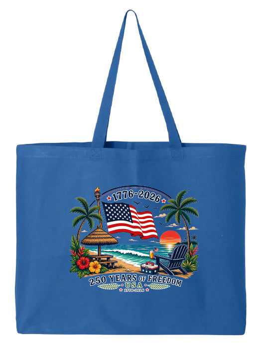Blue tote bag with beach scene and American flag design on a white background